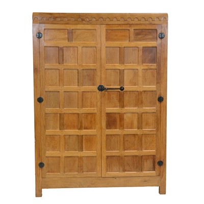 Lot 88 - Robert 'Mouseman' Thompson of Kilburn, an oak panelled double wardrobe, 1970s