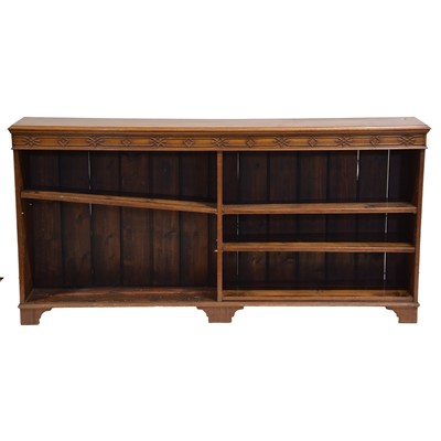 Lot 413 - Mahogany open bookcase, blind fret frieze