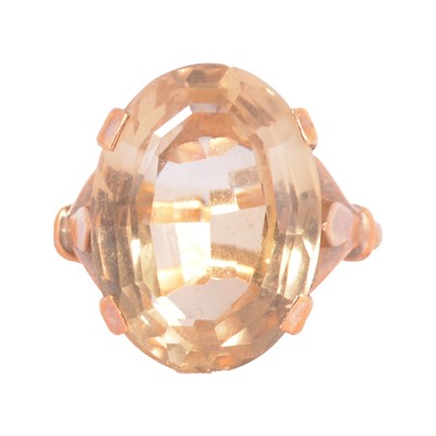 Lot 46 - A citrine dress ring.