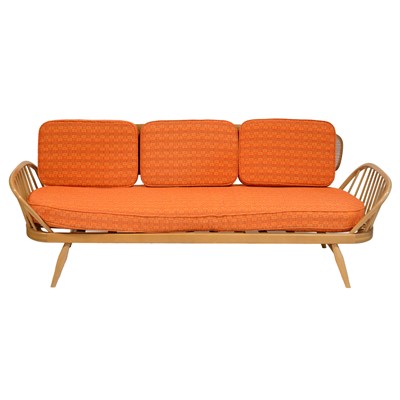 Lot 173 - Ercol light elm and beechwood studio couch