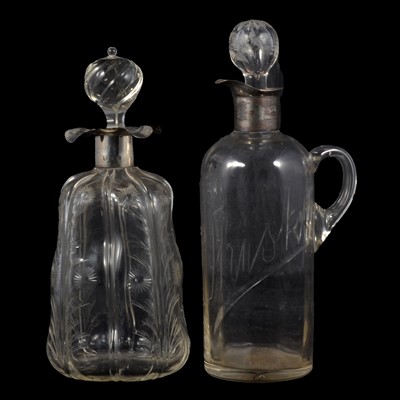 Lot 31 - Silver mounted whisky decanter and another silver mounted decanter