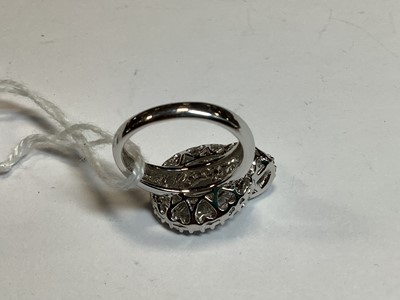 Lot 96 - A diamond loop ring.