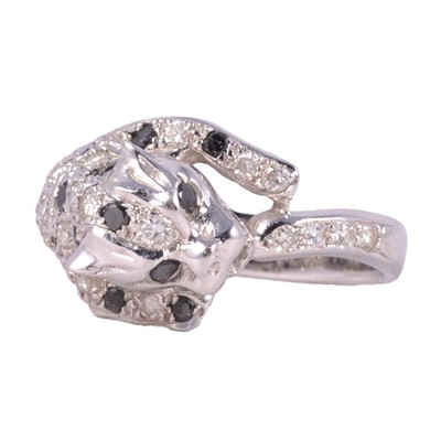 Lot 25 - A diamond panther ring.