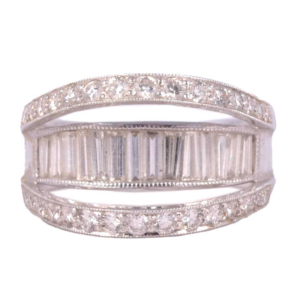 Lot 90 - A diamond double raised hoop ring.