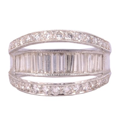 Lot 21 - A diamond double raised hoop ring.