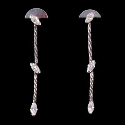 Lot 249 - A pair of diamond drop earrings.