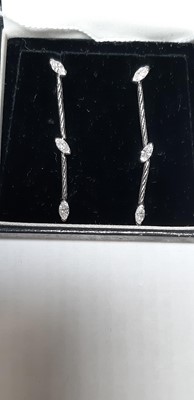 Lot 249 - A pair of diamond drop earrings.