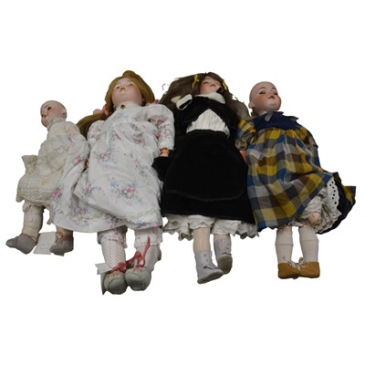 Lot 264 - Four Bisque head dolls, including Armand Marseille