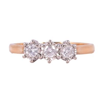 Lot 10 - A diamond three stone ring.