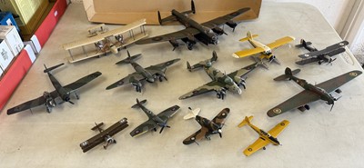 Lot 195 - Ten kit built model aircraft, with a collection of WW2 figures and other accessories