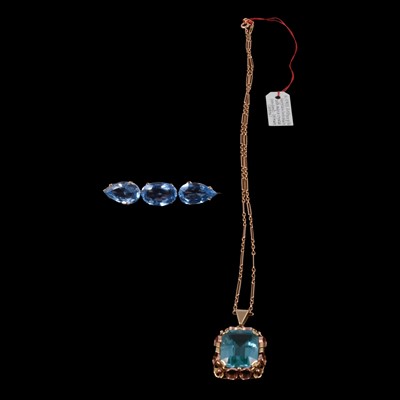 Lot 1208 - A synthetic turquoise spinel pendant on a chain, and a blue paste set bar brooch.