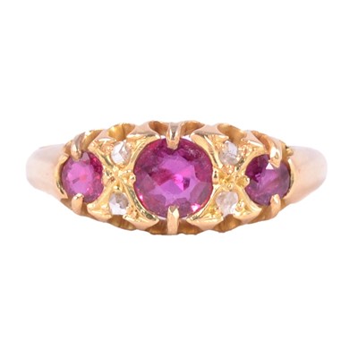 Lot 35 - A ruby and diamond ring.