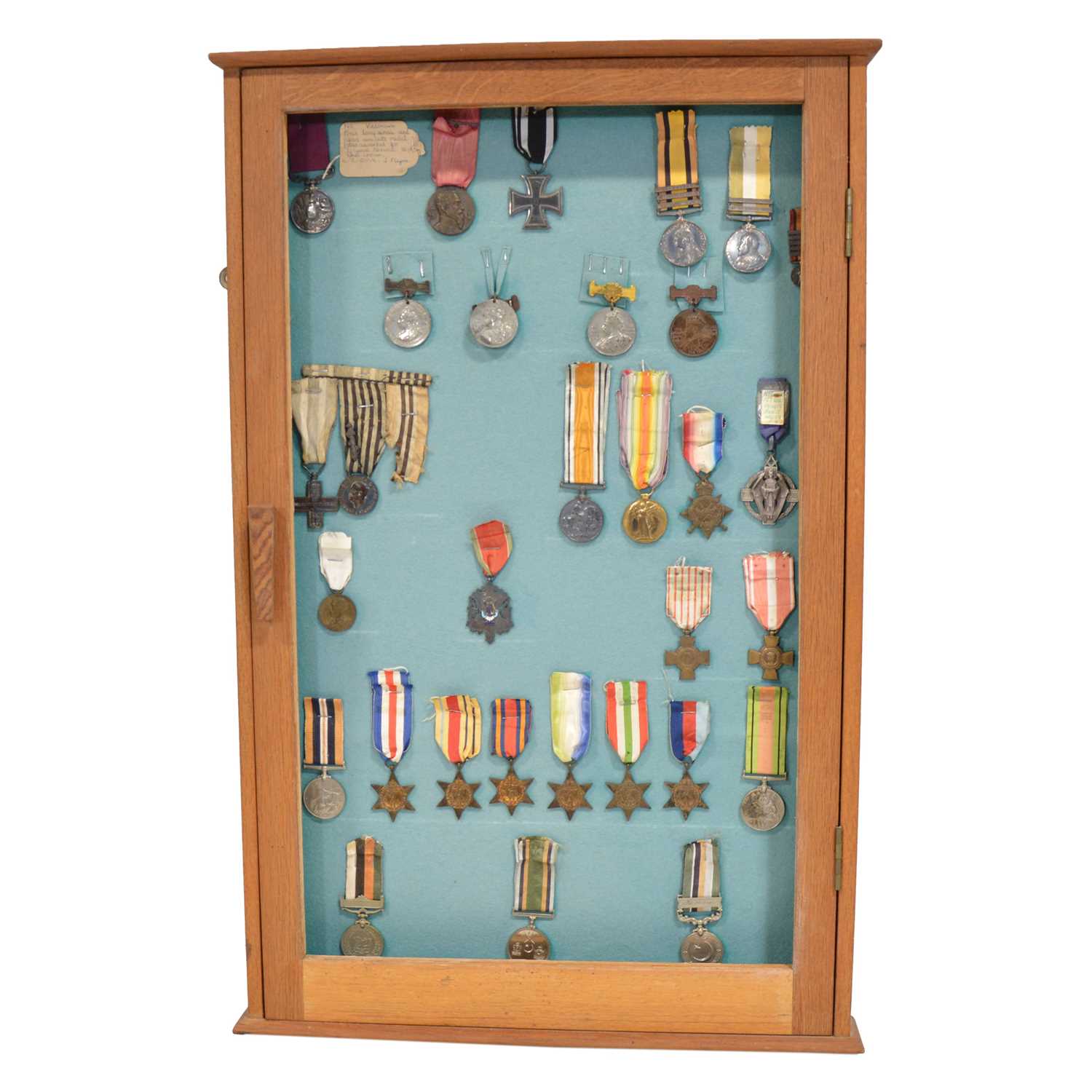 Lot 228 - Framed collection of medals,