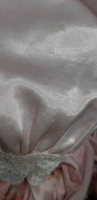 Lot 180 - Christian Dior - two hats, a pink nightgown and an August Silk dressing gown.