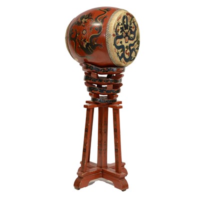 Lot 326 - Chinese red lacquered and painted drum on a stand