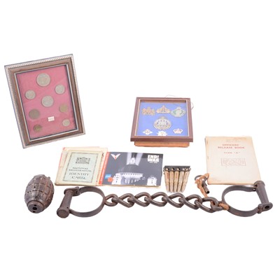 Lot 98 - Police / Militaria interest - set of antique metal handcuffs, grenade, badges and other items.