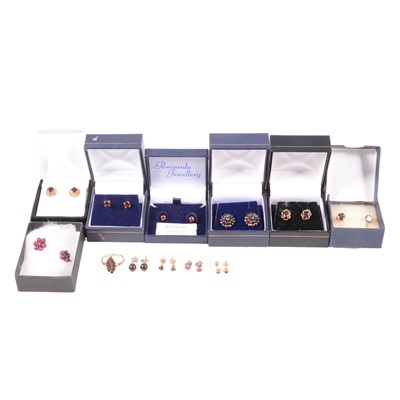 Lot 279 - Seven pairs of garnet stud earrings, other studs and a marquise shaped ring.