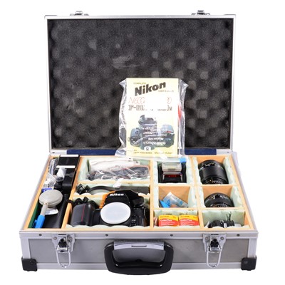 Lot 157 - Nikon F-601 camera body, lenses in a hard case