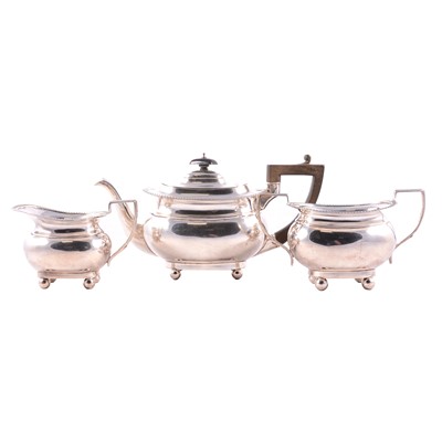 Lot 314 - Silver three piece teaset