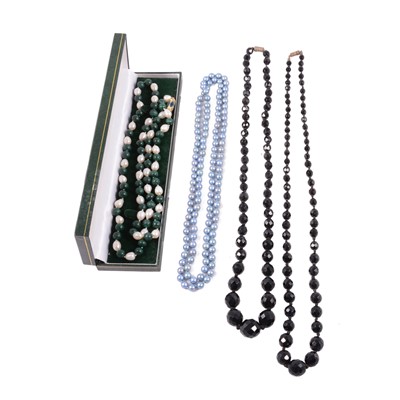 Lot 450 - Eight French glass, malachite and pearl, and cultured pearl necklaces.