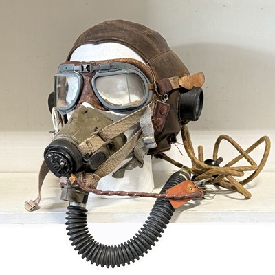 Lot 37 - WWII leather flying cap and respirator, and part harness