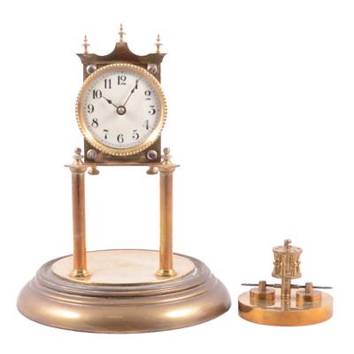 Lot 129 - Lacquered brass anniversary clock