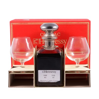 Lot 136 - Hennessy Napoleon Cognac, a 'Library' decanter set