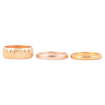 Lot 152 - Three gold wedding bands.