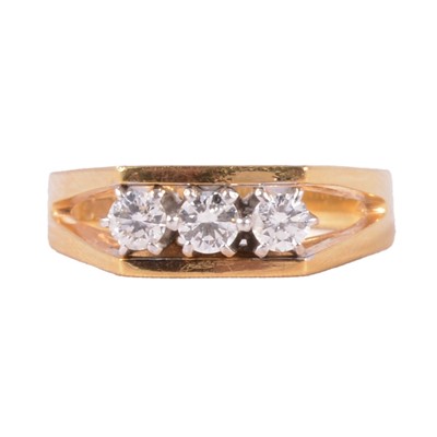 Lot 99 - A diamond three stone ring.