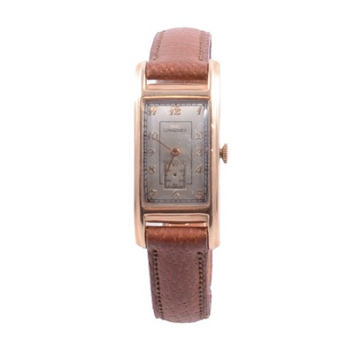 Lot 1033 - Longines - a 14K wristwatch, strap model.