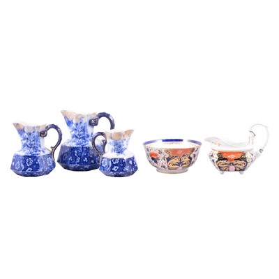 Lot 95 - A Crown Derby milk jug and sugar bowl, three graduate jugs