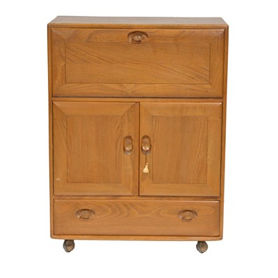 Lot 398 - Ercol light elm secretaire cabinet