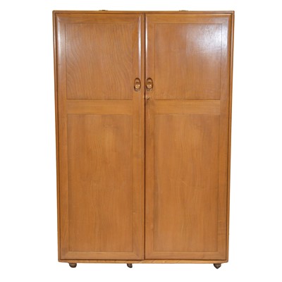 Lot 393 - Large Ercol light elm double wardrobe