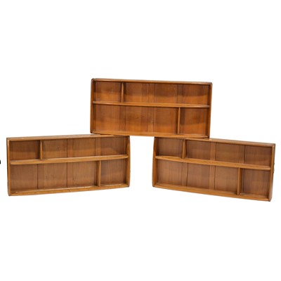 Lot 402 - Ercol, three light elm wall shelves