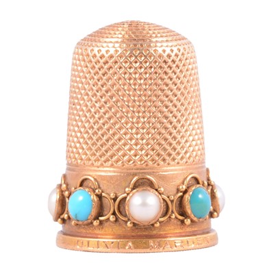 Lot 288 - Unmarked yellow metal thimble set with cabochon cut turquoise and cultured pearls.