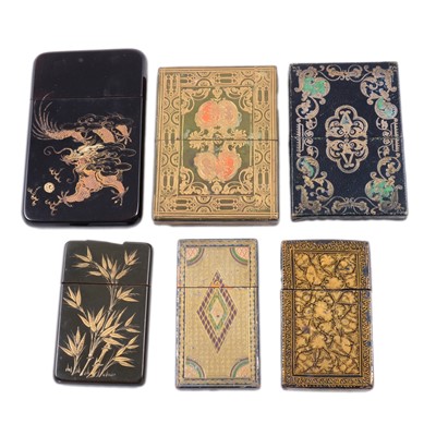 Lot 309 - Three papier-mache / black lacquer card cases; three leather tooled card / slip cases