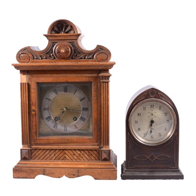 Lot 479 - Continental walnut mantel clock and a bakelite mantel clock