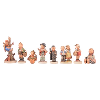 Lot 92 - Eight Hummel figurines.