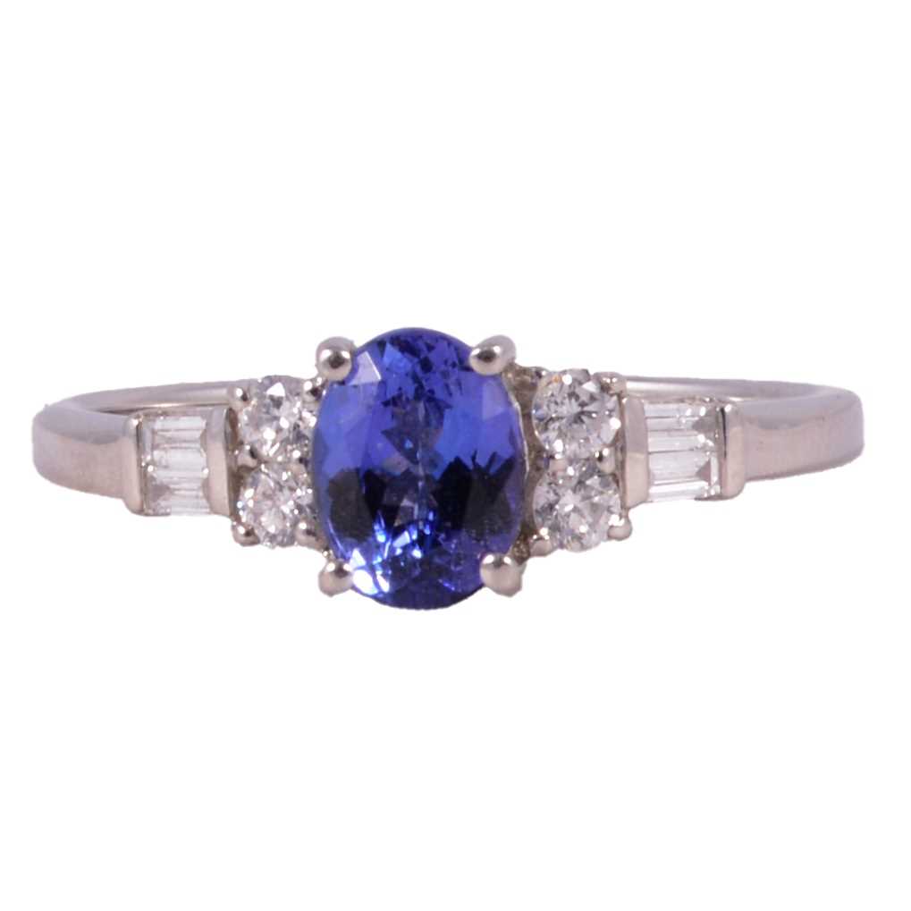 Lot 18 - A tanzanite and diamond ring.