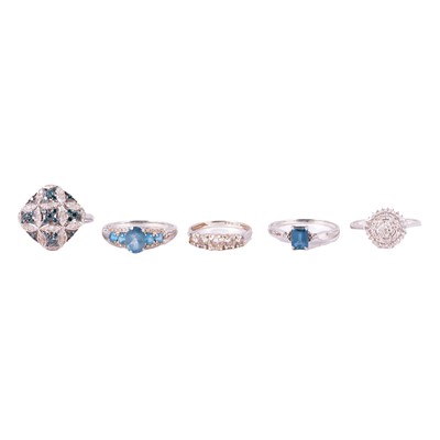 Lot 61 - Five gemset gold and silver rings, cubic zirconia, diamond, blue topaz.