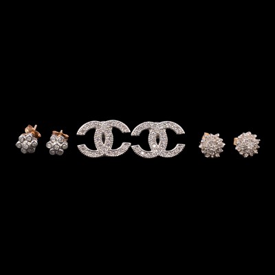 Lot 254 - Three pairs of diamond set stud earrings.