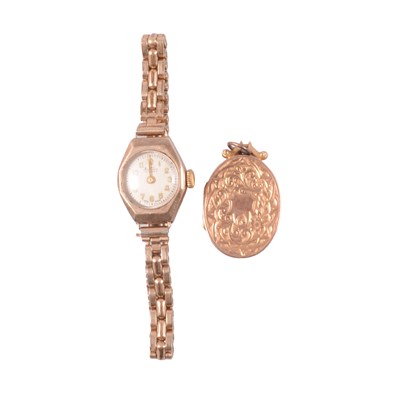 Lot 173 - A 15 carat yellow gold locket, and 9 carat yellow gold wristwatch.