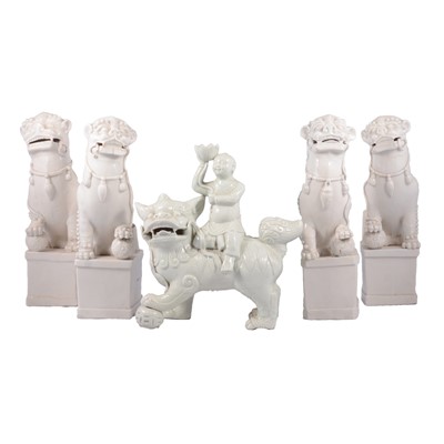 Lot 47 - Chinese pottery model, Boy riding a Kylin, and four Kylin