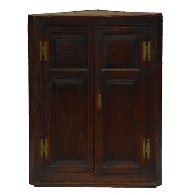 Lot 287 - Georgian oak hanging corner cupboard