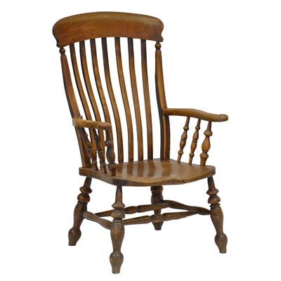 Lot 372 - Farmhouse fireside armchair elm and beech,...