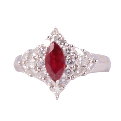 Lot 12 - A modern ruby and diamond marquise cluster ring.