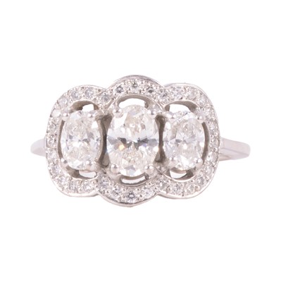 Lot 91 - A diamond three stone ring.