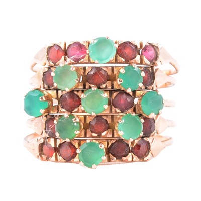 Lot 45 - A emerald and garnet five shank ring.