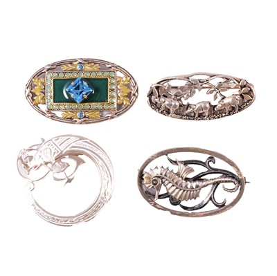 Lot 410 - Geoffrey Bellamy for George Tarratt - a seahorse brooch, and three other brooches.