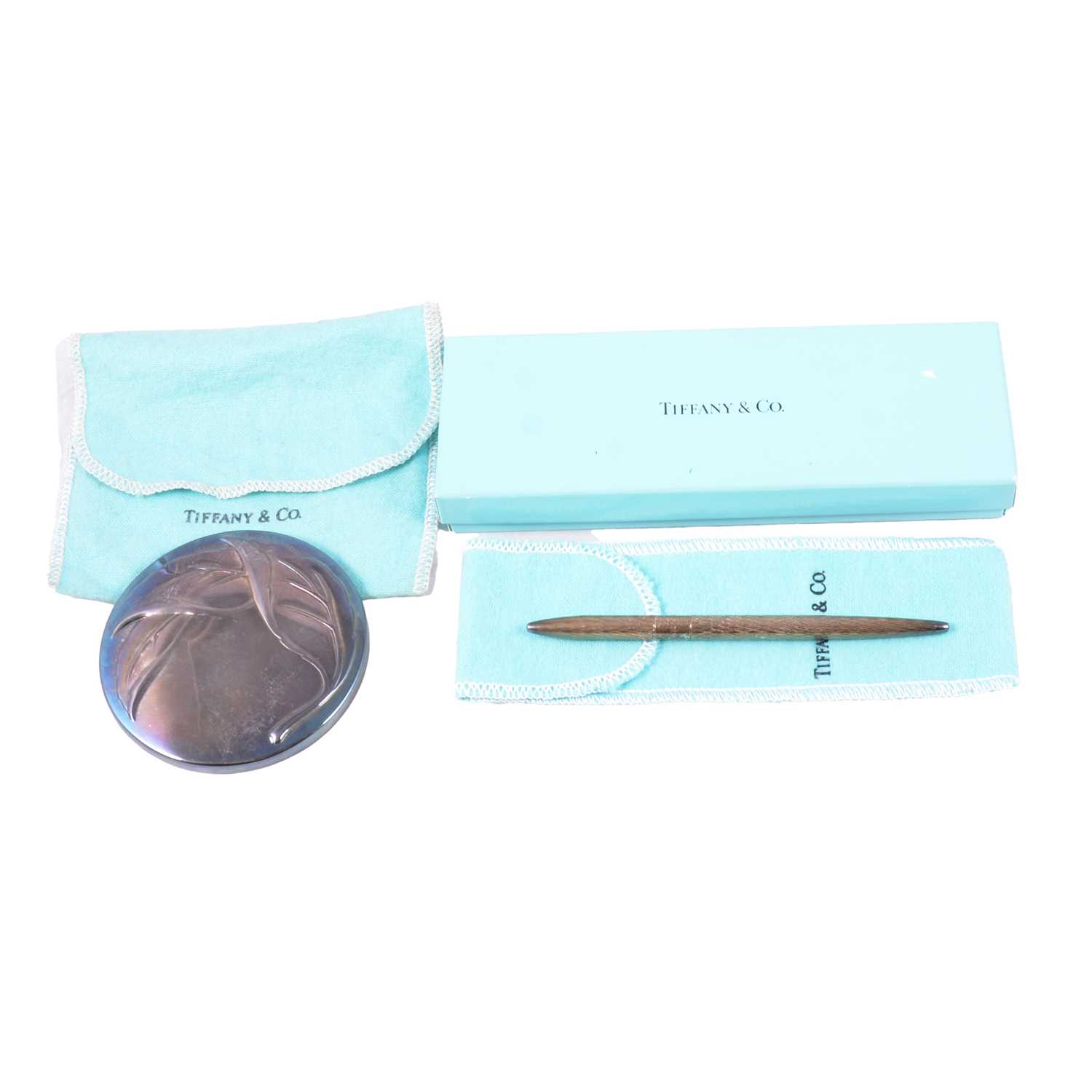 Lot 470 - Tiffany - a silver-plated handbag mirror, and silver pen.